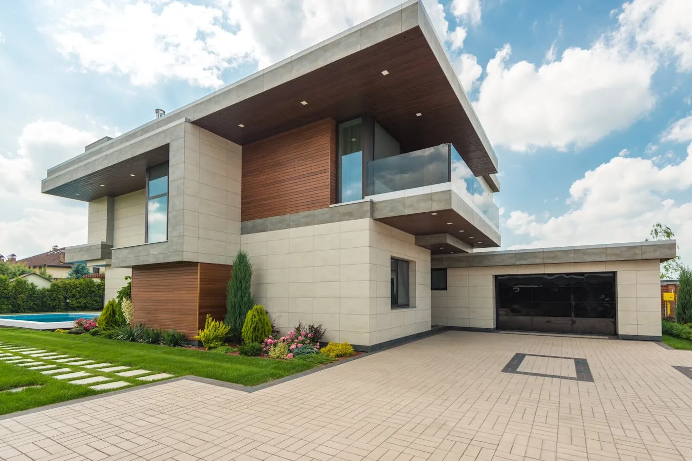 Wide concrete driveway leading to a double garage in Doncaster